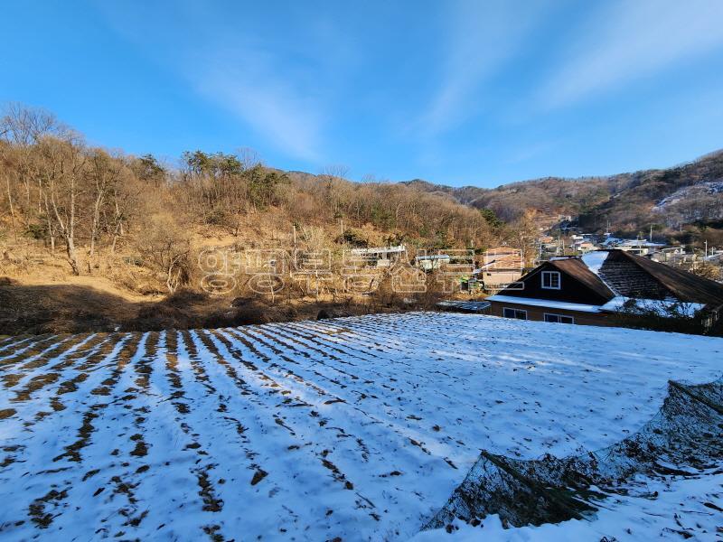 남향으로 탁트이고 완만한 경사에 구거와 접한 6번국도 접근성 좋은 토지_24